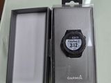 a box with a watch inside of it on a table