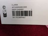 a close up of a red sweater with a barcode on it
