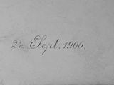 a black and white photo of a book with writing on it