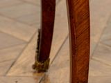 a close up view of the legs of a small table