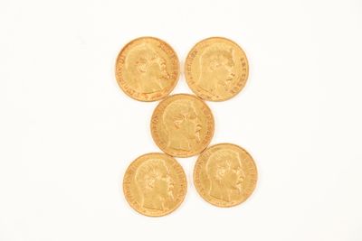 four gold coins are arranged in the shape of a man ' s face