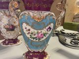three vases that are sitting on a table