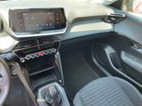 a dashboard of a car with a digital display on it