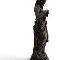 statue of a woman with a rosary in her hands on a white background