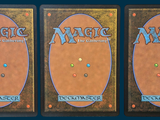 three decks of magic the gathering are shown on a blue background