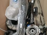 a cardboard box filled with assorted items in it