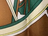 a close up of a tie with a horse on it