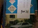 a picture of a car in a crate with a price tag on it