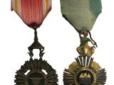 deux médailles et une médaille sur fond blanc