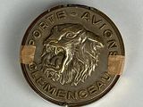 an image of a coin with a lion head on it
