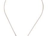 un ensemble composé d'un collier et de boucles d'oreilles sertis de diamants rouges et blancs