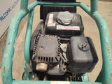 an image of a small engine on a cart