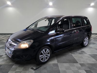 a picture of a black van parked in a garage