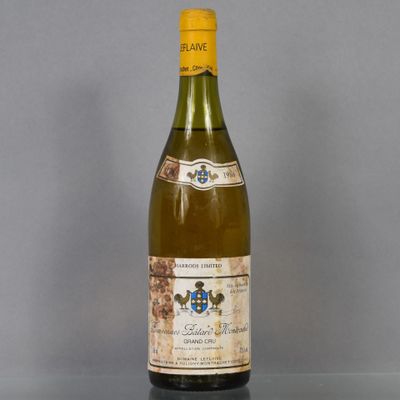a bottle of wine that is sitting on a table