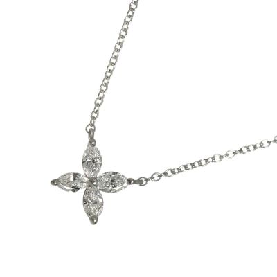 an image of a diamond cross necklace on a chain