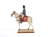 une figurine représentant un homme à cheval