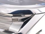 a close up of a watch with a black face