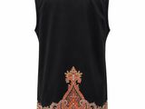 a black vest with an orange paisley design on the front