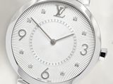an image of a close up of a wrist watch on a white surface