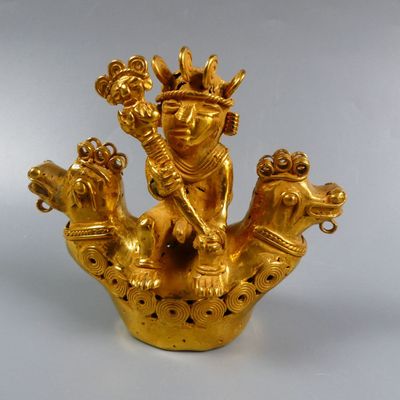 Colombie. Chaman au grand sceptre orné d’une statuette, siég…