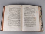 an open book that is sitting on a table