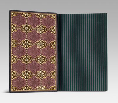 the front and back cover of a book with a gold and red design