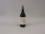 a bottle of wine that is sitting on a table