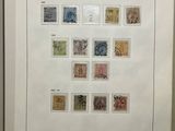an open book with a bunch of different stamps on it