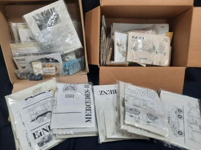 several boxes filled with different types of sewing supplies on a table