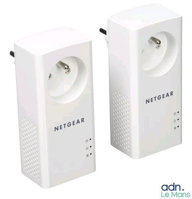 two white power plugs sitting next to each other on a white surface