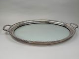 a silver tray with handles and handles on a white background
