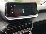 a car dashboard with a cell phone in it
