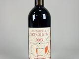 a bottle of wine that is sitting on a table
