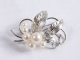 silver and pearl flower broocher with leaves and pearls