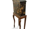 an old wooden cabinet with a drawer on a stand on a white background