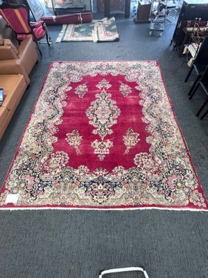 Grand tapis en laine nouée main à décor d'un médaillon centr…