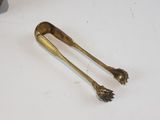 two spoons and a fork sitting on a table