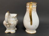 two vases that are sitting next to each other on a table