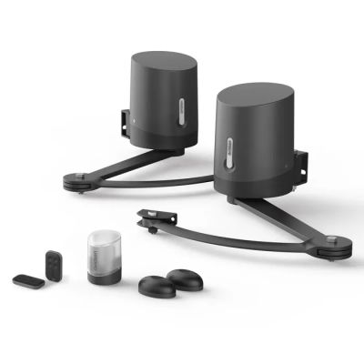 the two speakers are connected to each other on a white surface