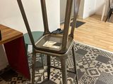 a chair that is sitting in the corner of a room