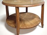 a round table with a glass top on a white background