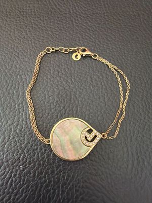 a gold bracelet with aba aba aba aba aba aba aba aba aba aba aba aba aba aba aba aba aba
