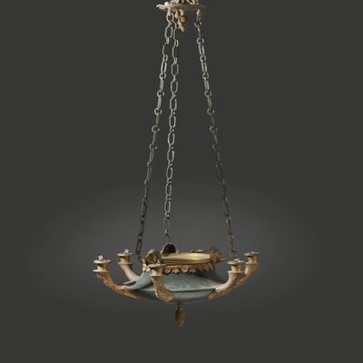 an image of a hanging light fixture with a bird on it