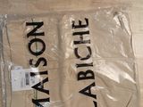 a plastic bag that has some type of clothing on it