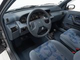 dashboard of a car with blue seats and a steering wheel