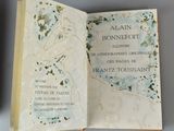 an open book with a drawing of a woman on it