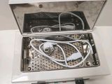 a white box with wires in it sitting on a table