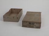two cardboard boxes are sitting side by side on a white surface