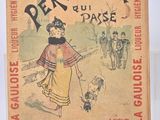 un vieux livre sur lequel figure l'image d'une femme promenant son chien
