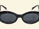 black cat eye sunglasses on a white background with a white background